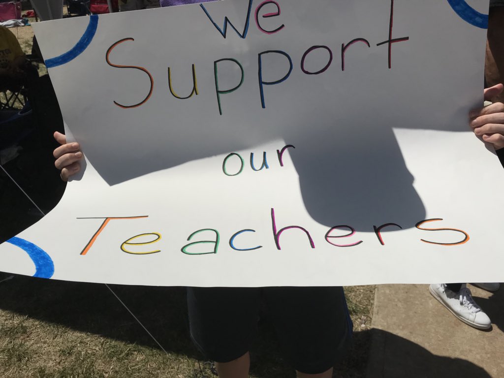 Lots of signs here at the Capitol. #okteacherwalkout 