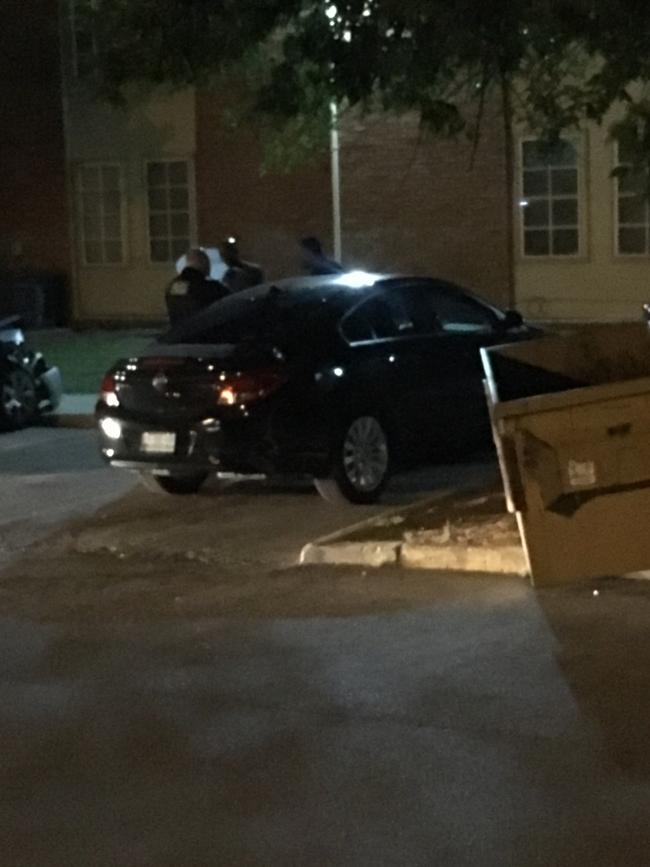 Two teenage girls are placed in handcuffs after an armed robbery before midnight Friday near East Apache Street and North Utica Avenue