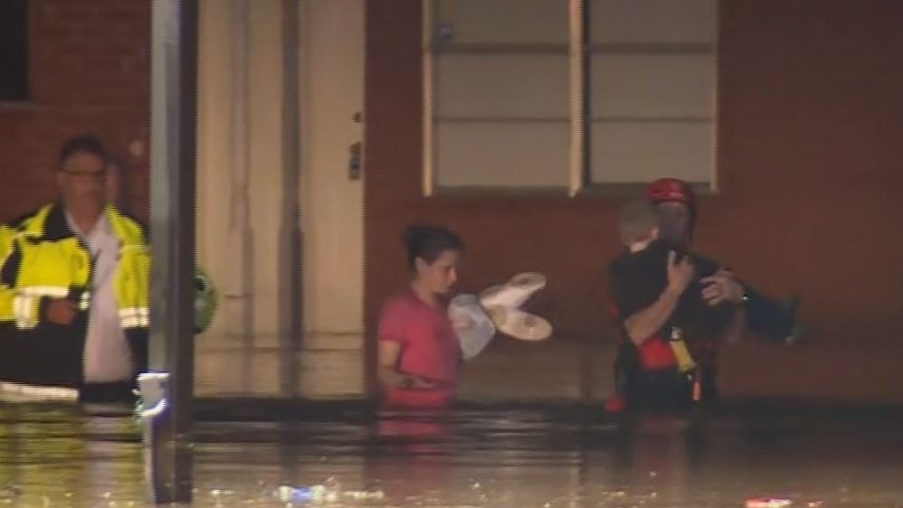 Firefighters rescue child, family from flooded home in Oklahoma City    