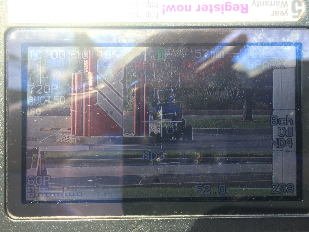 Bomb squad robot is examining suspicious bag left at an ATM in front of a Bank of Oklahoma across the street from Penn Square Mall