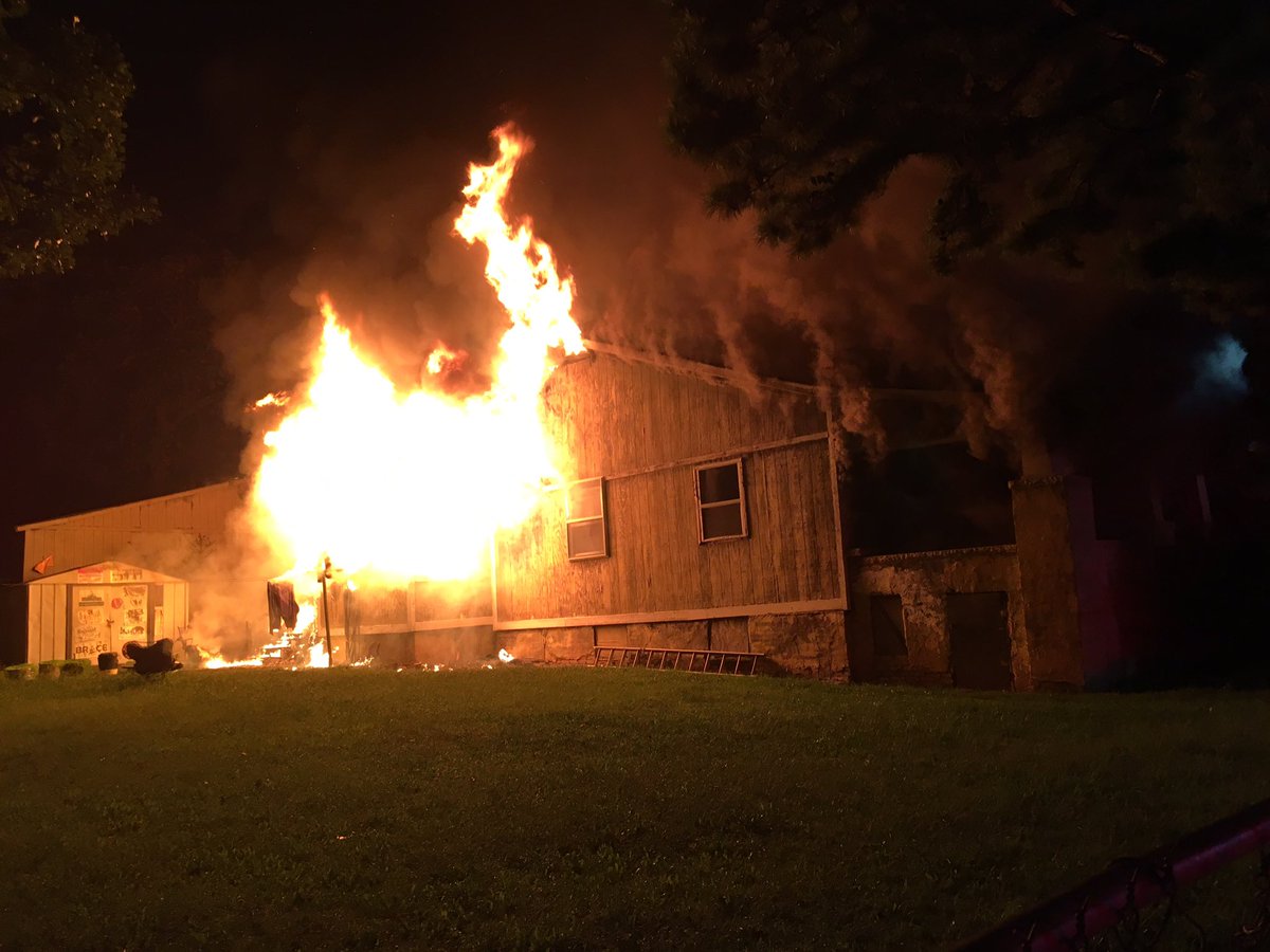 Massive flames shooting out of a home near Southwest Blvd and HWY 75.