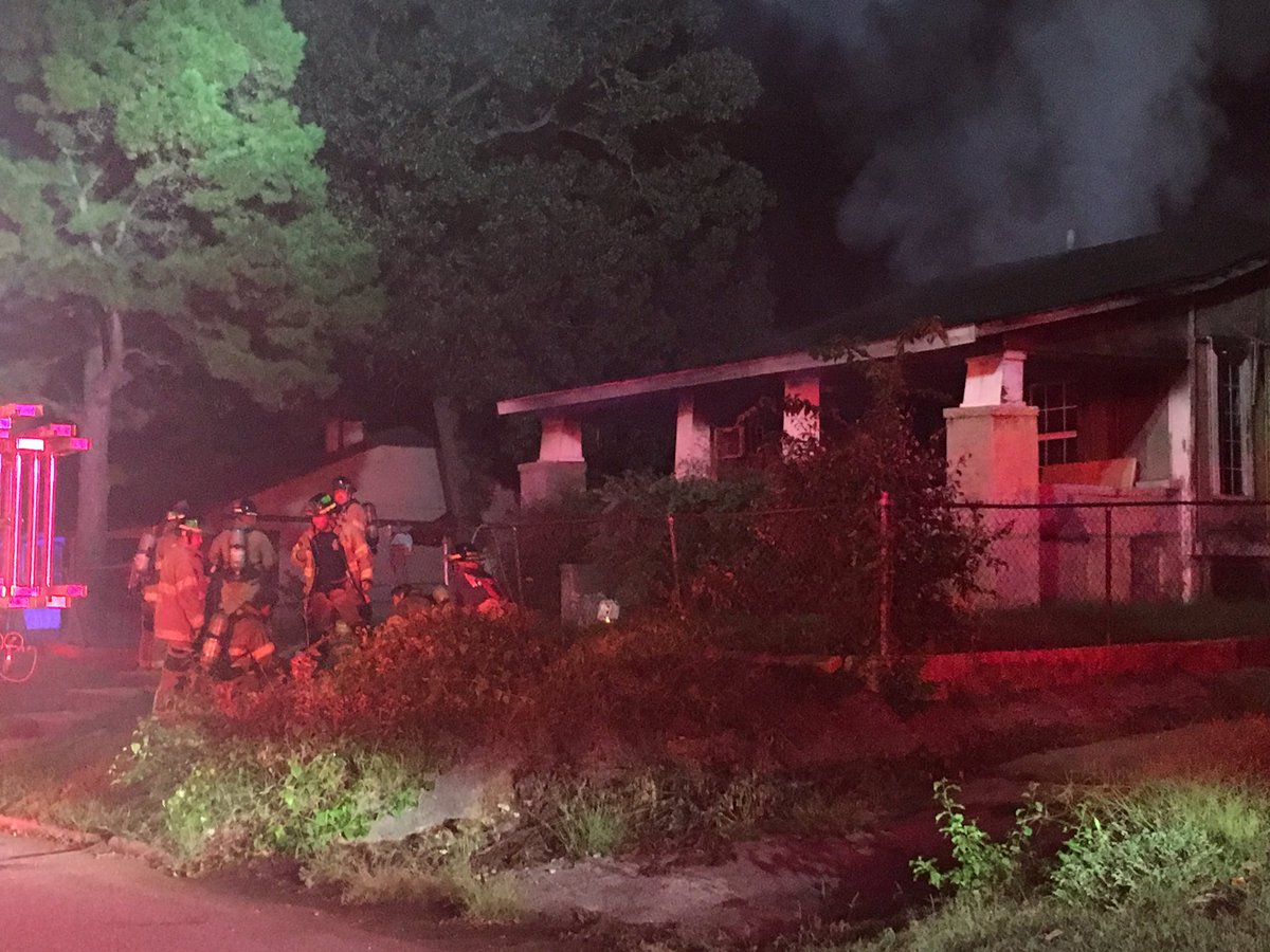 Massive flames shooting out of a home near Southwest Blvd and HWY 75.