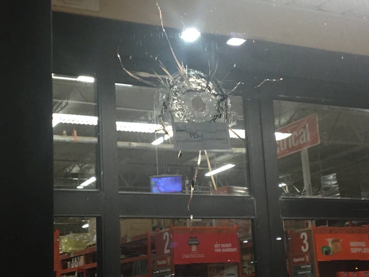 Police say someone shot through the front window of  Home Depot