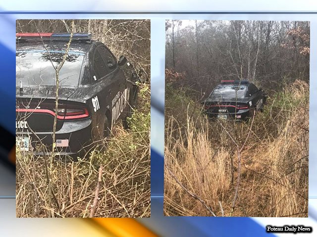 Poteau police are searching for an escaped inmate who they say crashed a stolen police cruiser near Heavener.    