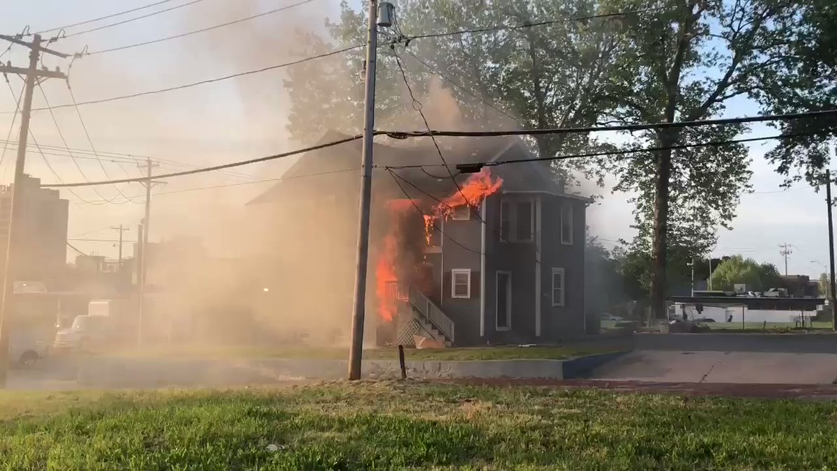 Oklahoma City fire crews rescued one person from the roof a burning home early Monday morning.    