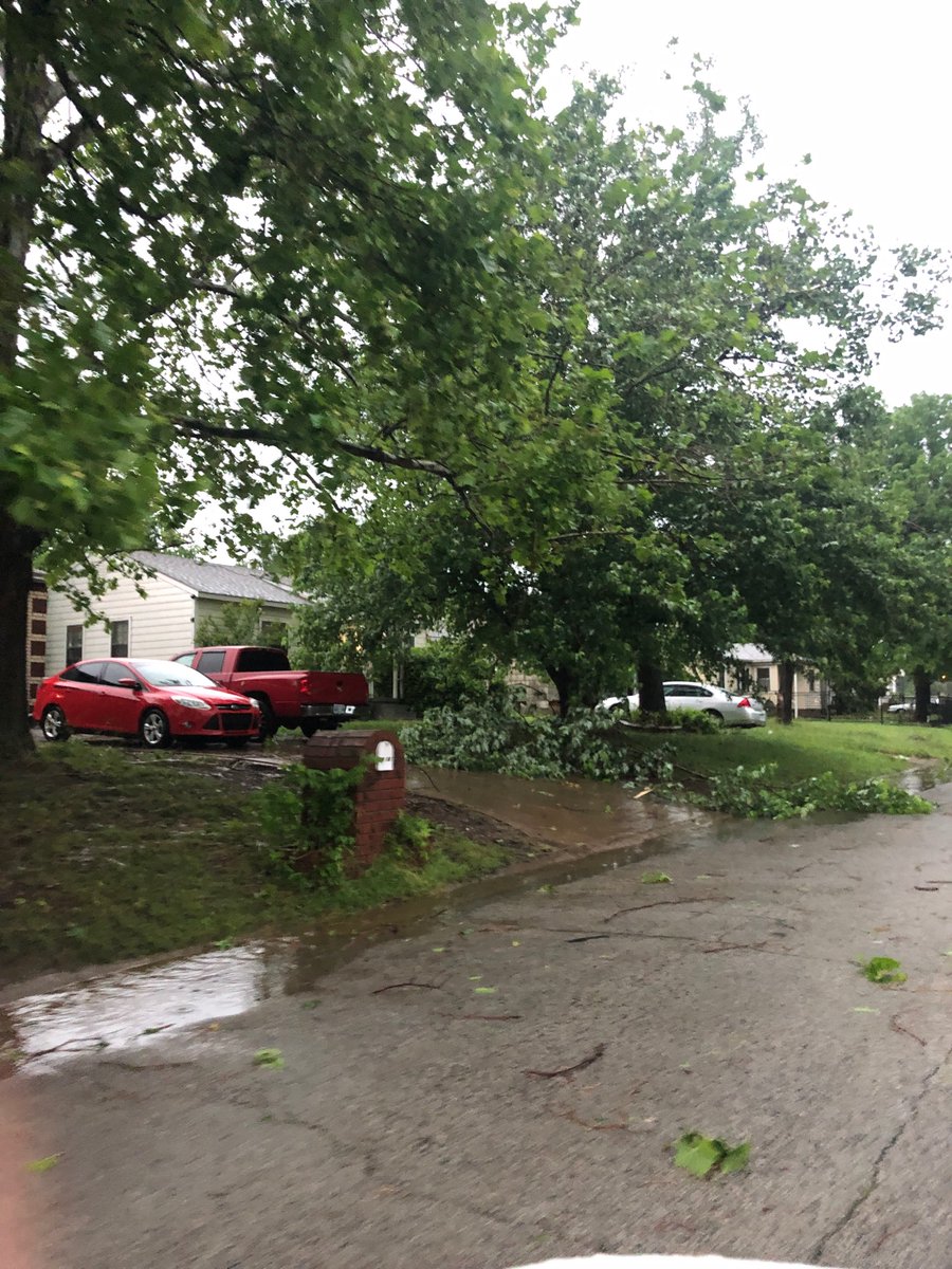 Damage around Celia Clinton Elementary in Tulsa after possible tornado. Damaged railroad crossing at pine and Harvard caused freight train to stop, blocking traffic. 