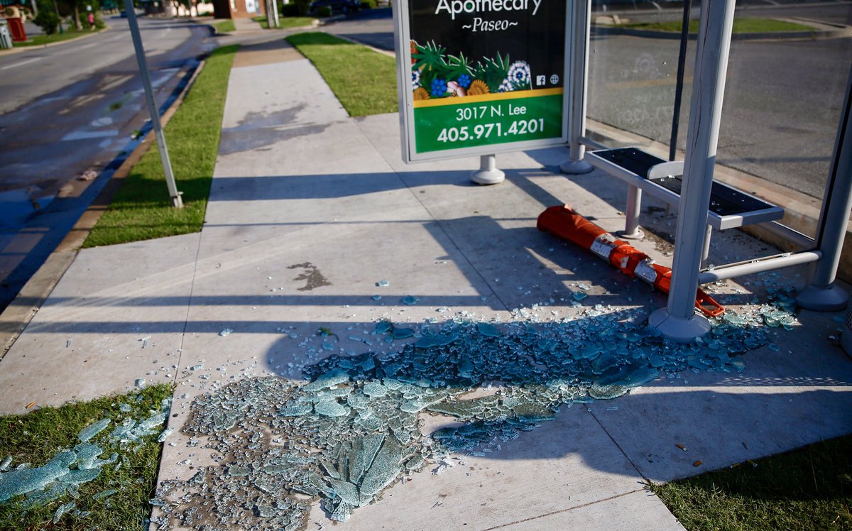 Damage at 23rd and Classen st the Rainbow building and a bus shelter across the street  