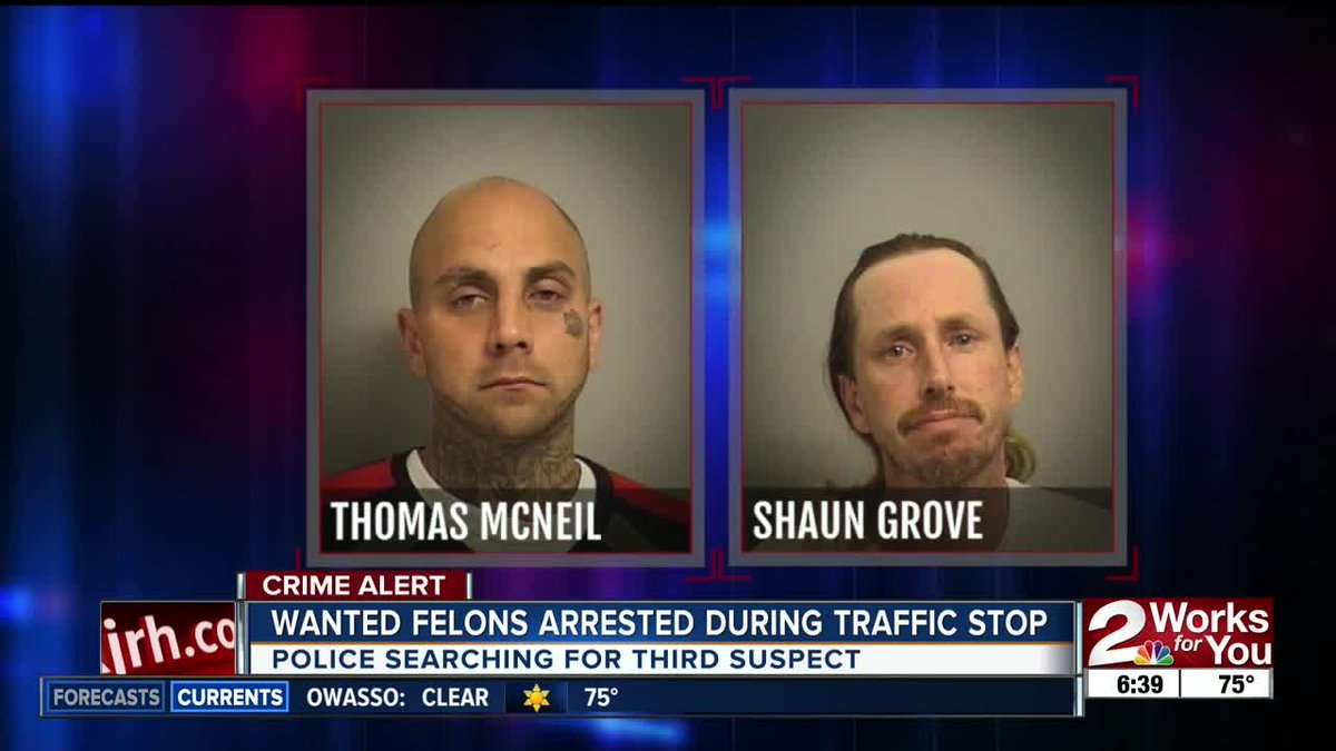 Two felons have been arrested and a third suspect is on the run after Tulsa police say they pulled over a vehicle loaded with guns.    