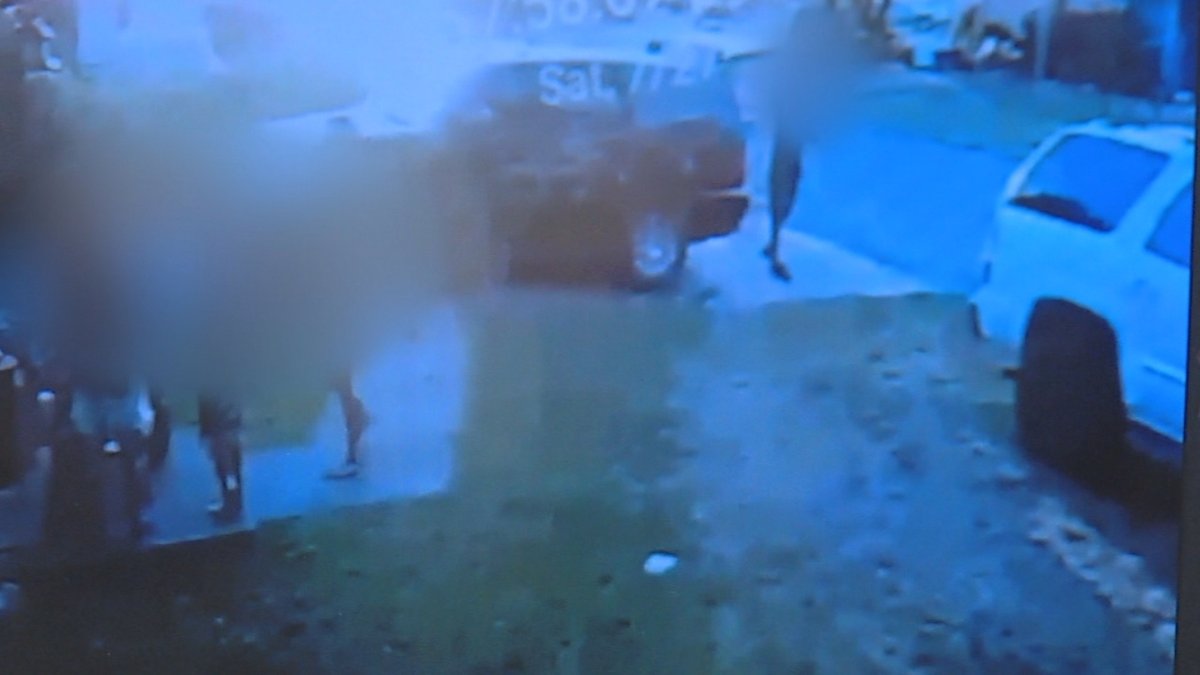 Catoosa police are searching for two men who were seen shooting at a home, nearly hitting a group of children