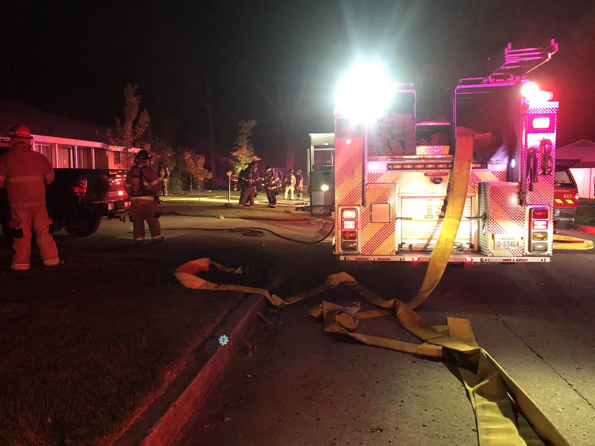 Firefighters on scene of a house fire near 51st and Harvard. The homeowners are out of the house as well as two animals.