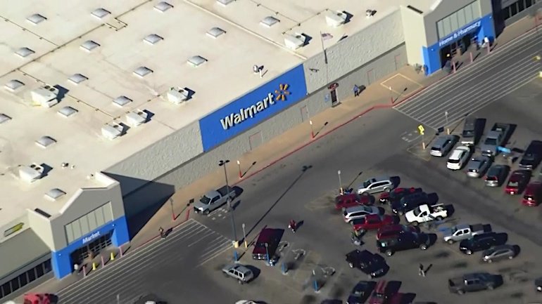 Gunman believed to be among 3 dead after shooting outside Walmart in Oklahoma. Approximately 7 gunshots could be seen in the windshield of a red sports car in the parking lot. 