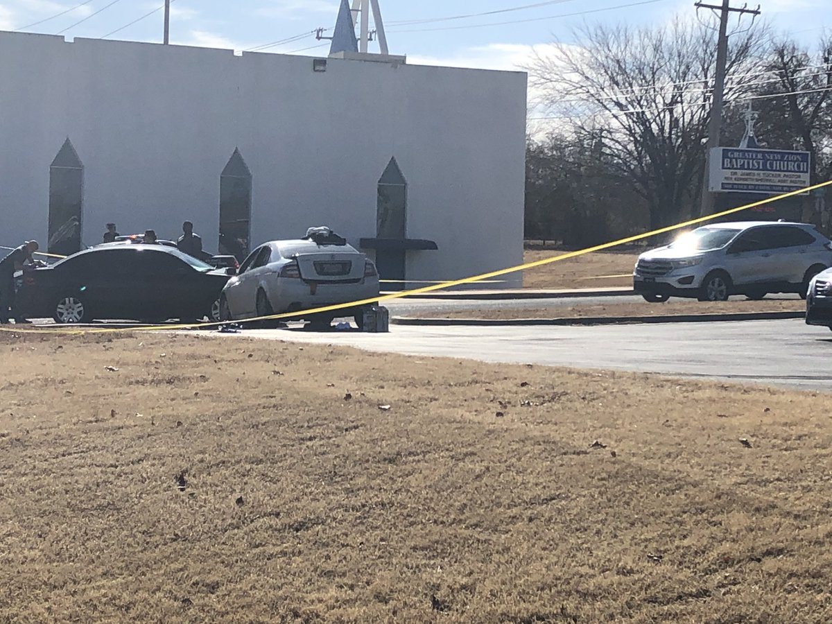Still a very active scene here at NE 28th and Kelley where two people were allegedly shot outside during a funeral. Witnesses tell one of the victims was by this white car when the shooting happened.