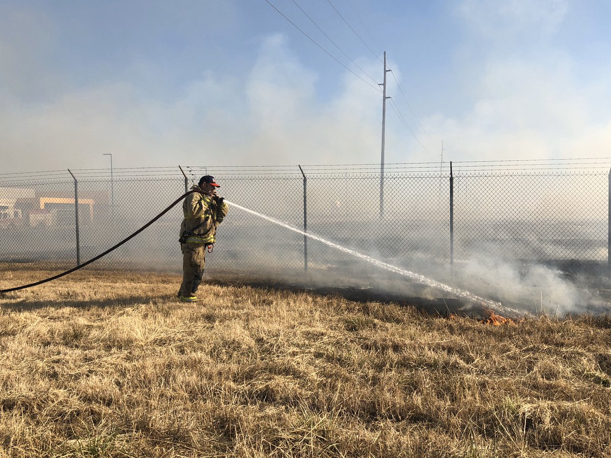 TAC 8 | Grass Fire | Firefighters from OKC and Will Rogers Airport FD have the forward progress of this fire stopped. There have been no structures damaged and the flight line of WRWA are not affected.  Crews are hitting hot spots now