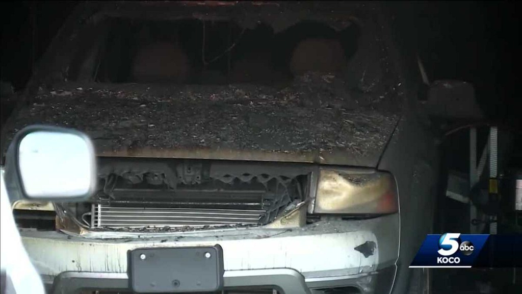 A Midwest City man remains in an area hospital Wednesday night after he suffered severe burns last month when an auto shop caught fire.