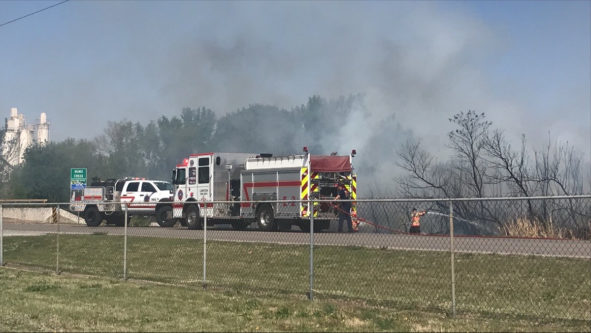 Firefighters are on the scene of an outside fire near 23rd and G Ave in Lawton. It appears they have contained it but are continuing to put water on hot spots. There have been no reports of damage or injuries at this time