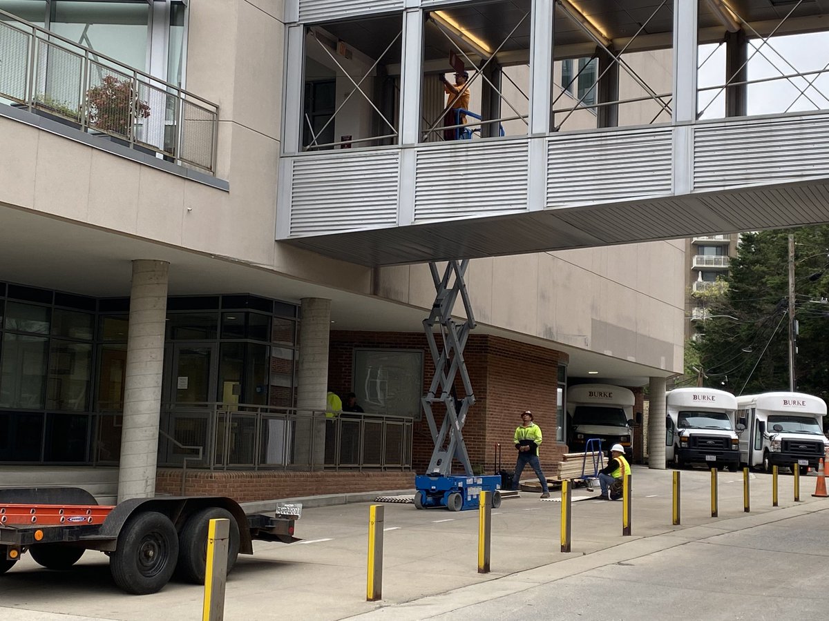 This morning, crews are boarding up pedestrian bridge at Edmund Burke School in DC, where windows were shot out by a sniper-style shooter Friday. The community is also showing love with cards and flowers. Police say Raymond Spencer injured 4 before taking his own life