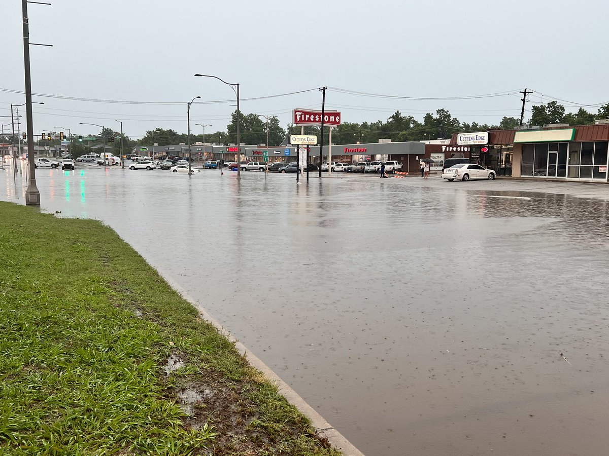 Flood Ave and Main St is closed due to flooding. At least one car is stuck. According to the City of Norman this area is known to flood because of local drainage problems in older parts of the city