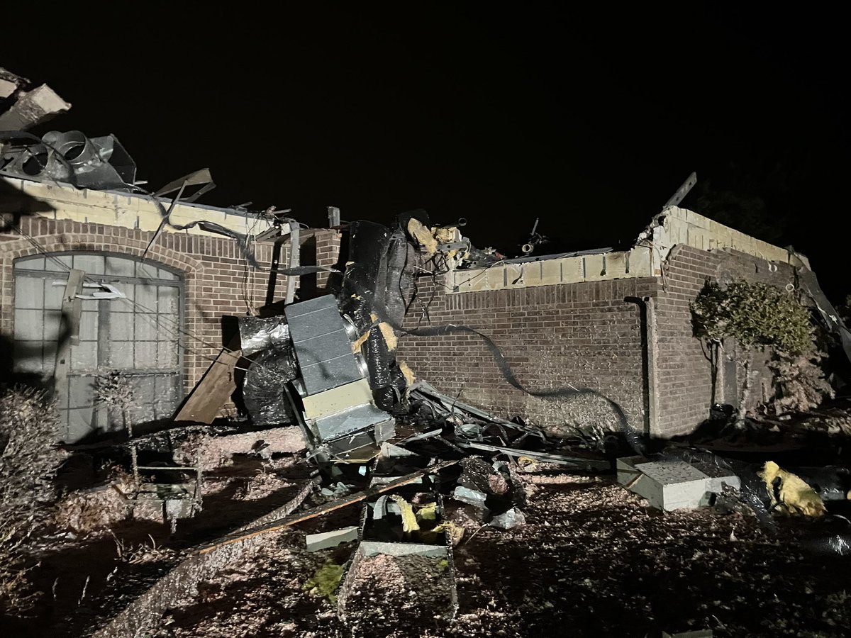 More tornado damage in Norman:  This is also off of 36th and Lindsay. The roof is totally ripped off of this home. The homeowner tells he's spending the night at a family members house and will start the clean up process once the sun comes up