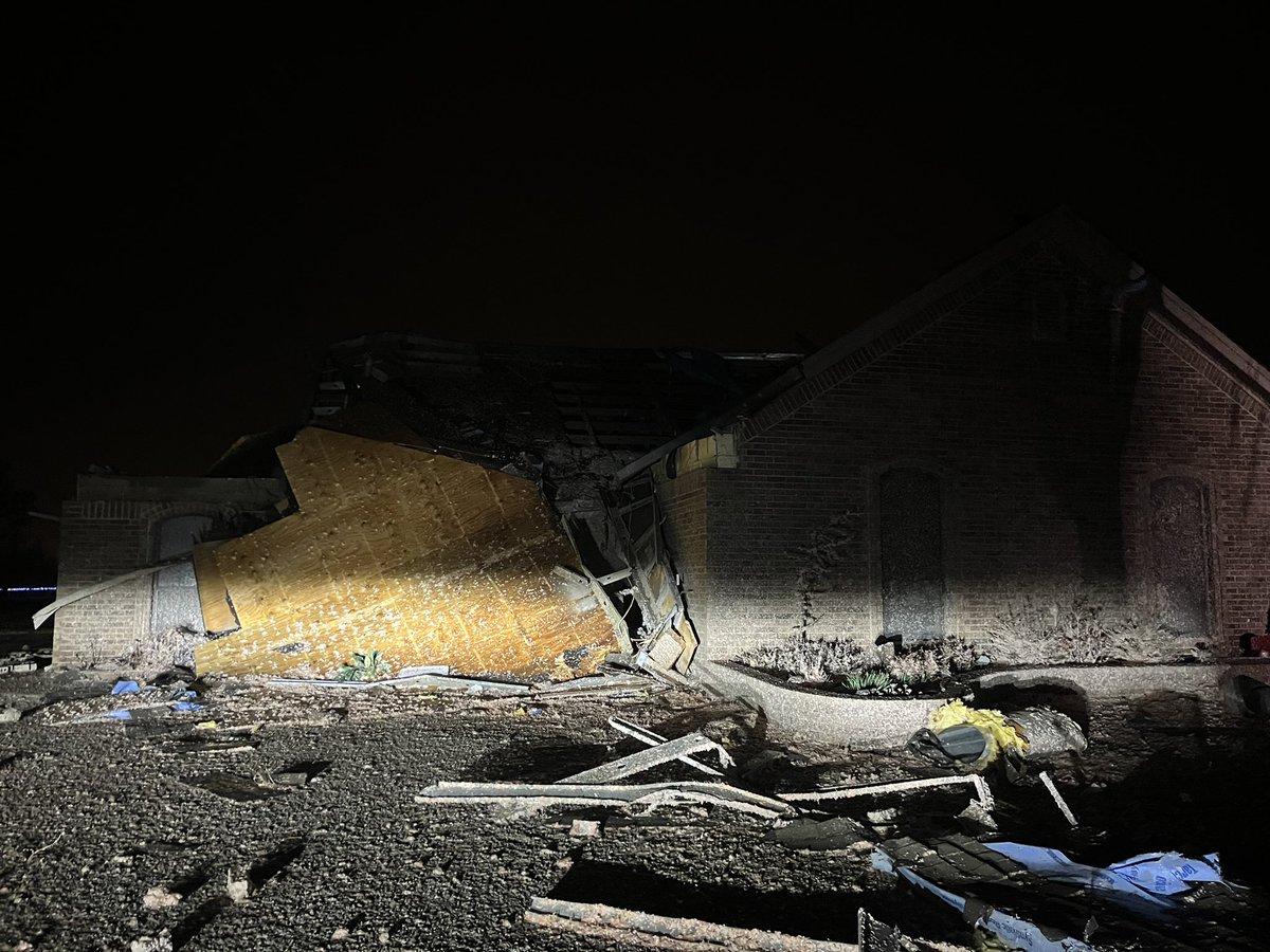 More tornado damage in Norman:  This is also off of 36th and Lindsay. The roof is totally ripped off of this home. The homeowner tells he's spending the night at a family members house and will start the clean up process once the sun comes up